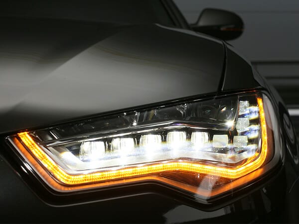 up close led/hid car lighting on a black car